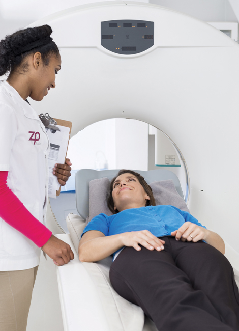 Zwanger-Pesiri CT technologist with patient