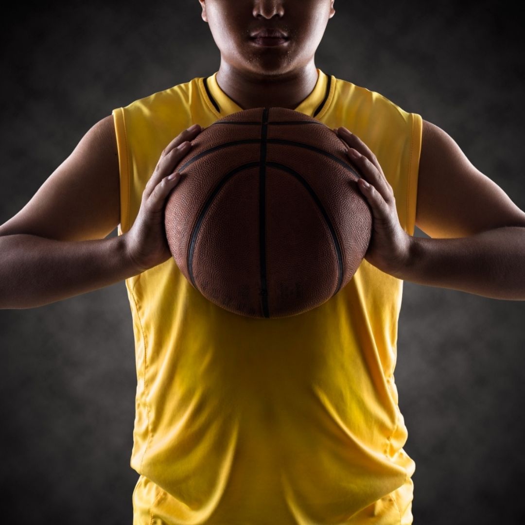 teenager with basketball
